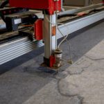 water jet to custom cut turf logos
