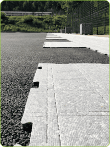 installing shock pads for sports turf fields
